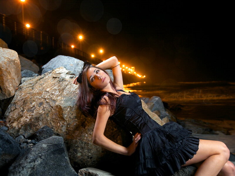 Woman in Black Dress — Dramatic, Night, Photograph, Rocks