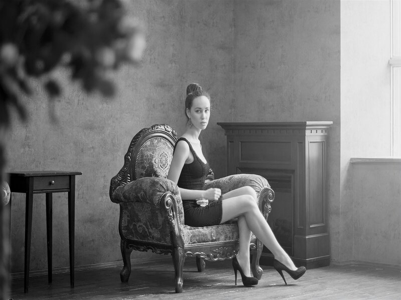 Woman in Black Dress — Dramatic, Photograph, Armchair