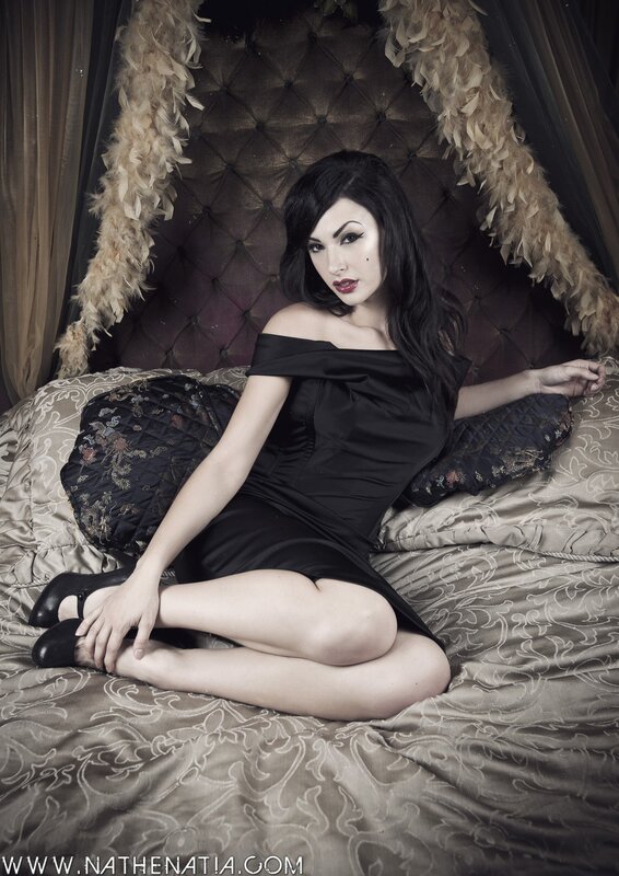 Woman in Black Dress — Dramatic, Photograph, Bed, Feather Boa