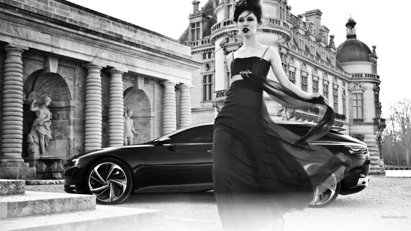Woman in Black Dress — Dramatic, Photograph, Car, Statue