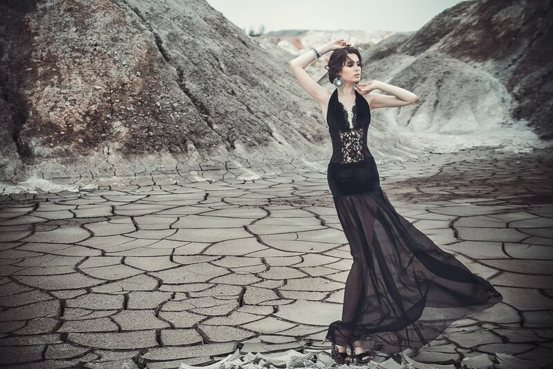 Woman in Black Dress — Dramatic, Photograph, Cracked Ground