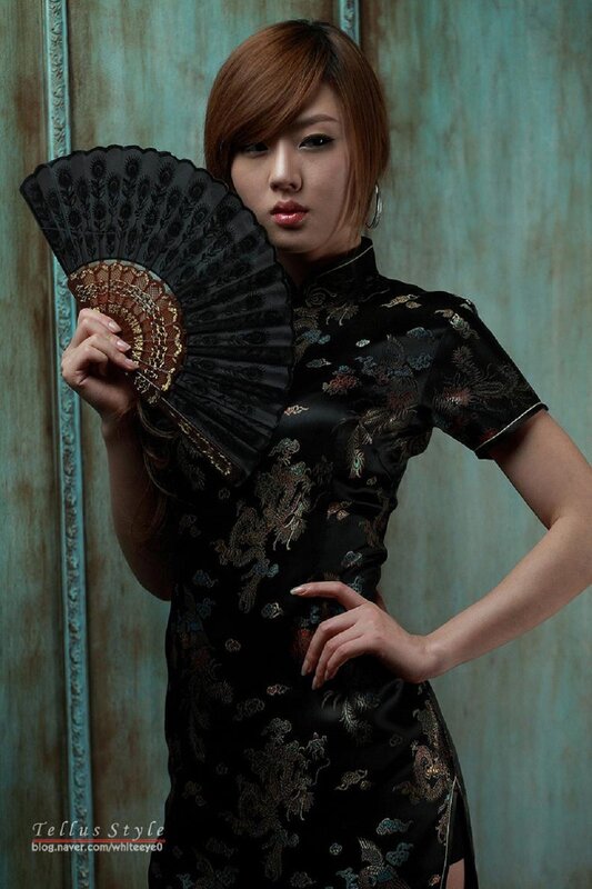 Woman in Black Dress — Dramatic, Photograph, Fan, Earring