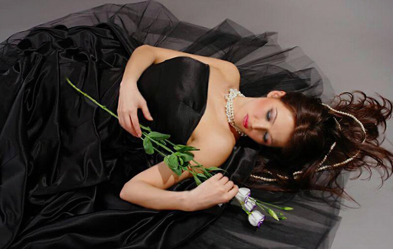 Woman in Black Dress — Dramatic, Photograph, Flower