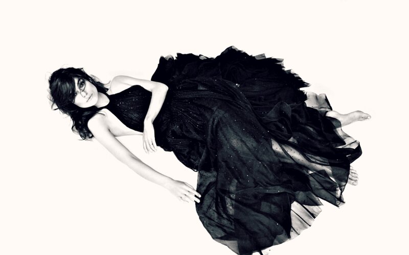 Woman in Black Dress — Dramatic, Photograph, Glasses