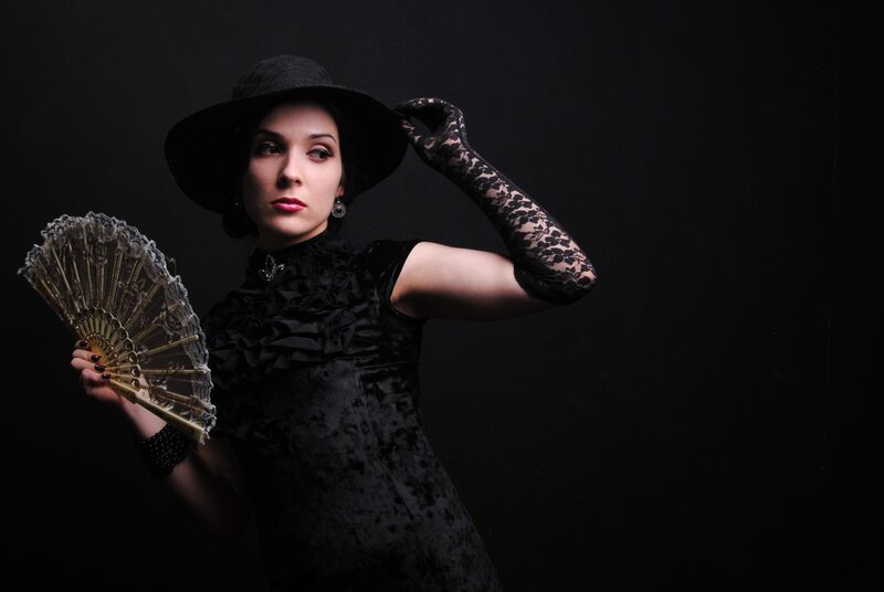 Woman in Black Dress — Dramatic, Photograph, Hat, Fan
