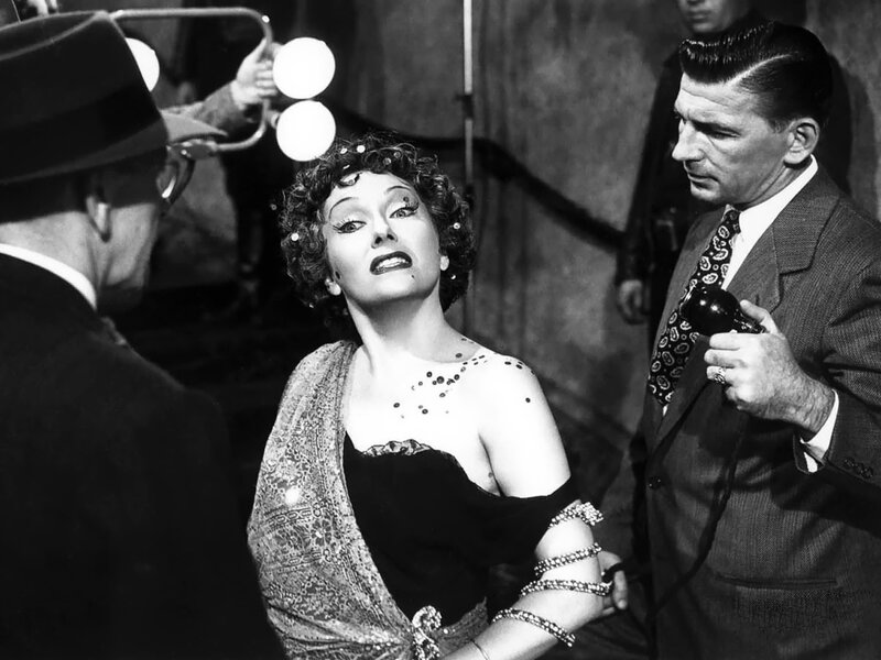 Woman in Black Dress — Dramatic, Photograph, Man with Microphone
