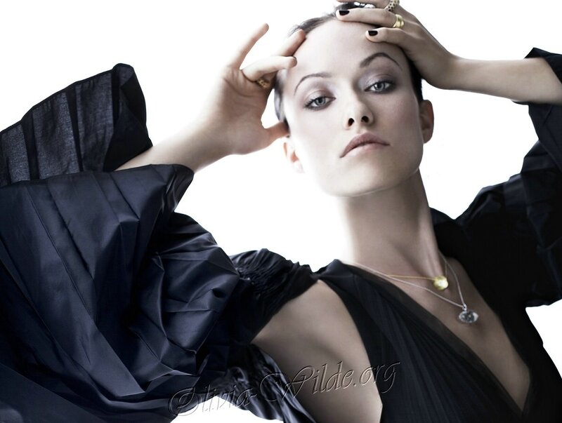 Woman in Black Dress — Dramatic, Photograph, Necklace, Ruffled Sleeves