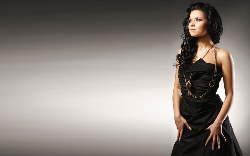 Woman in Black Dress — Dramatic, Photograph, Necklace, Studio Background
