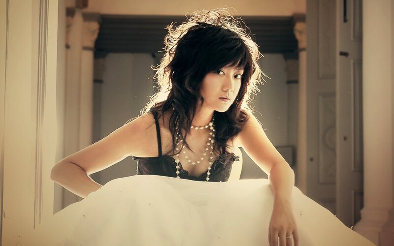 Woman in Black Dress — Dramatic, Photograph, Pearl Necklace, White Skirt