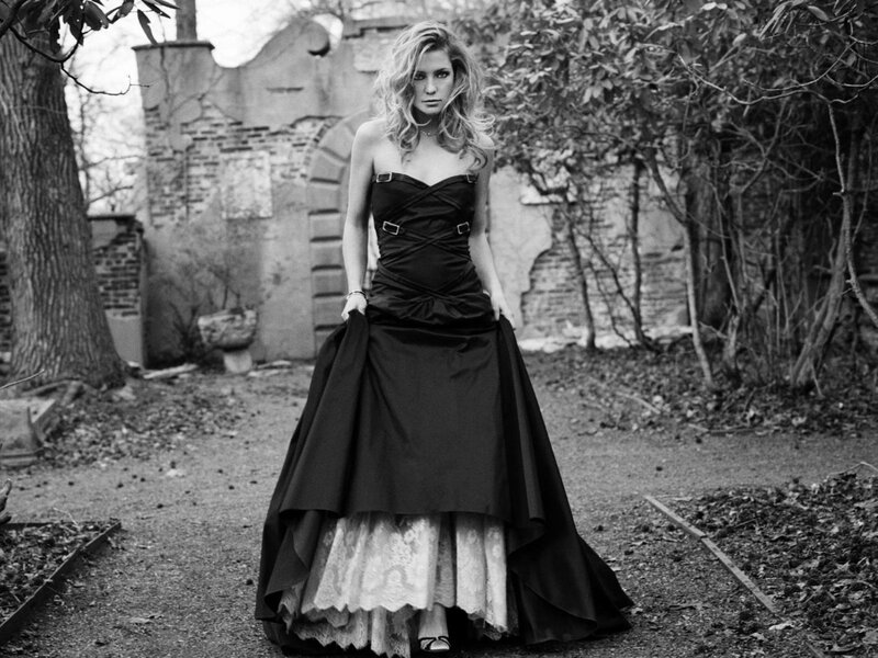 Woman in Black Dress — Dramatic, Photograph, Ruins
