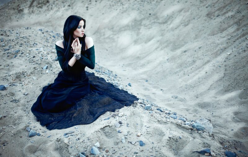 Woman in Black Dress — Dramatic, Photograph, Sand, Rocks