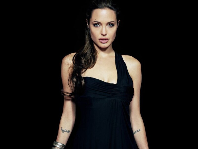 Woman in Black Dress — Dramatic, Photograph, Tattoo, Bracelet