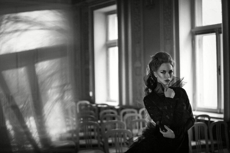 Woman in Black Dress — Dramatic, Photograph, Window, Chairs