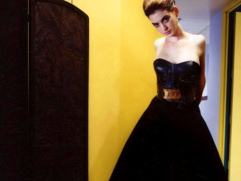 Woman in Black Dress — Dramatic, Photograph, Yellow Wall