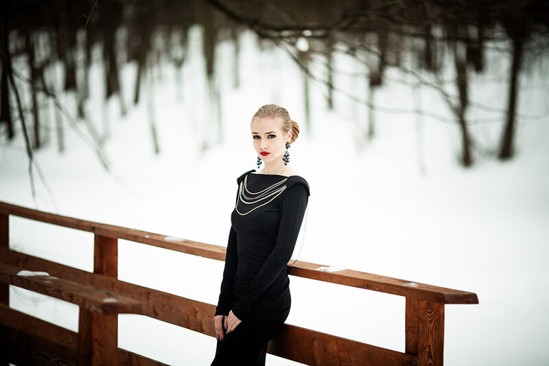 Woman in Black Dress — Dramatic, Winter, Photograph, Wooden Railing