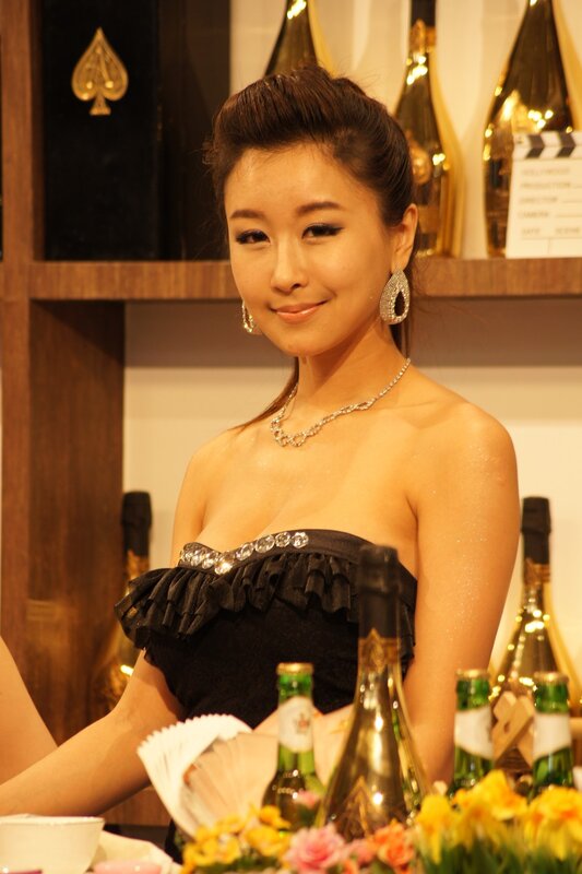 Woman in Black Dress — Formal, Photograph, Bottles