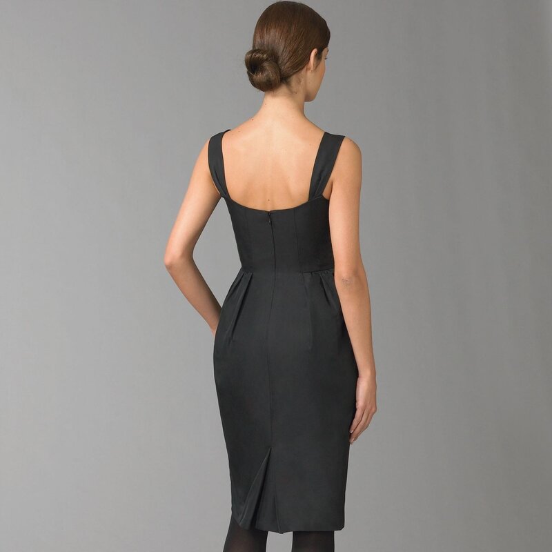 woman in black dress from back