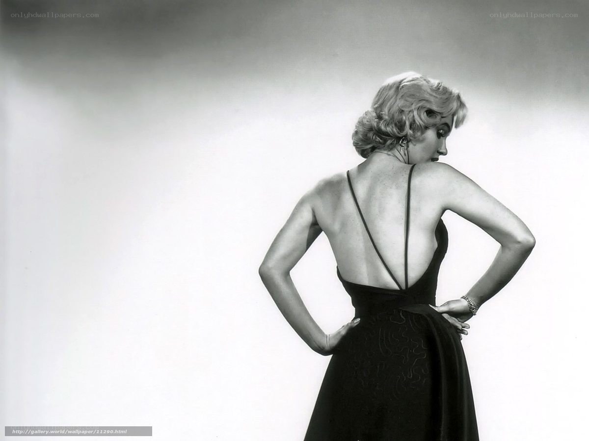 woman in black dress from behind
