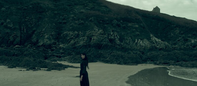 Woman in Black Dress — Green, Somber, Morning