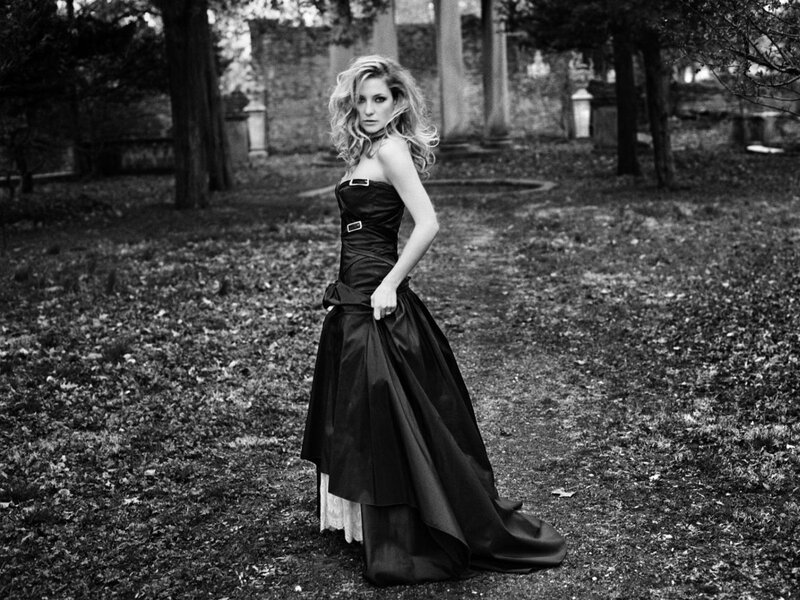 woman in black dress in cemetery