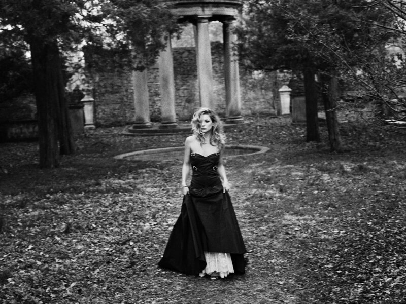 woman in black dress in garden