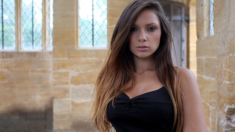 woman in black dress indoors