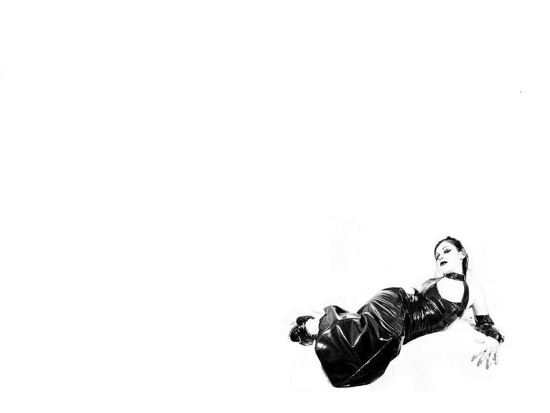 woman in black dress lying down