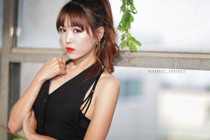 Woman in Black Dress — Neutral, Afternoon, Photograph, Earrings