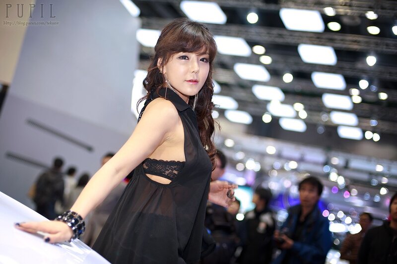 Woman in Black Dress — Neutral, Photograph, Crowd