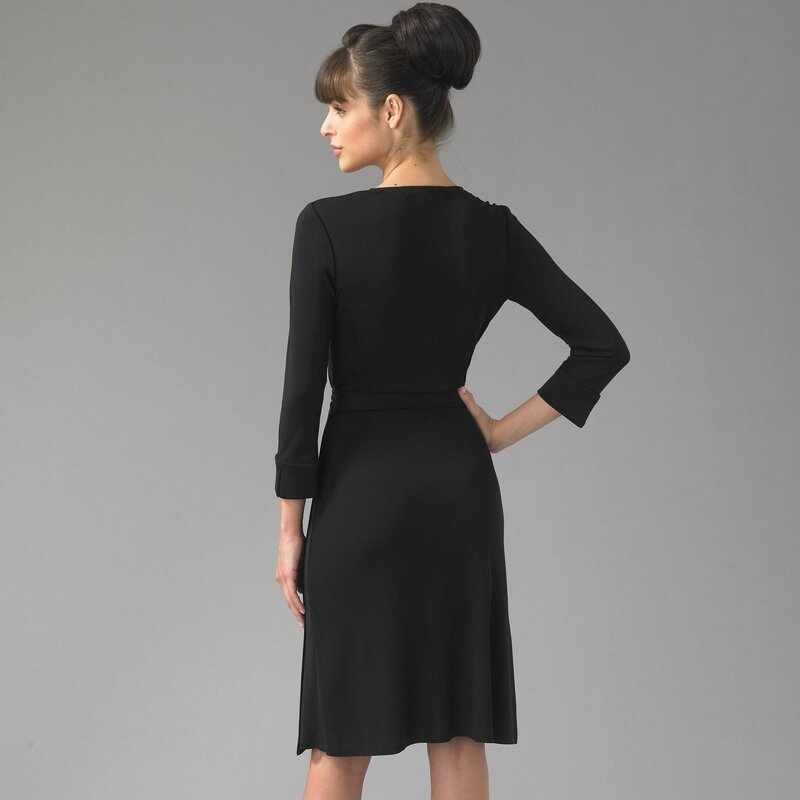 Woman in Black Dress — Neutral, Photograph, Hair Bun, Gray Background, Gray