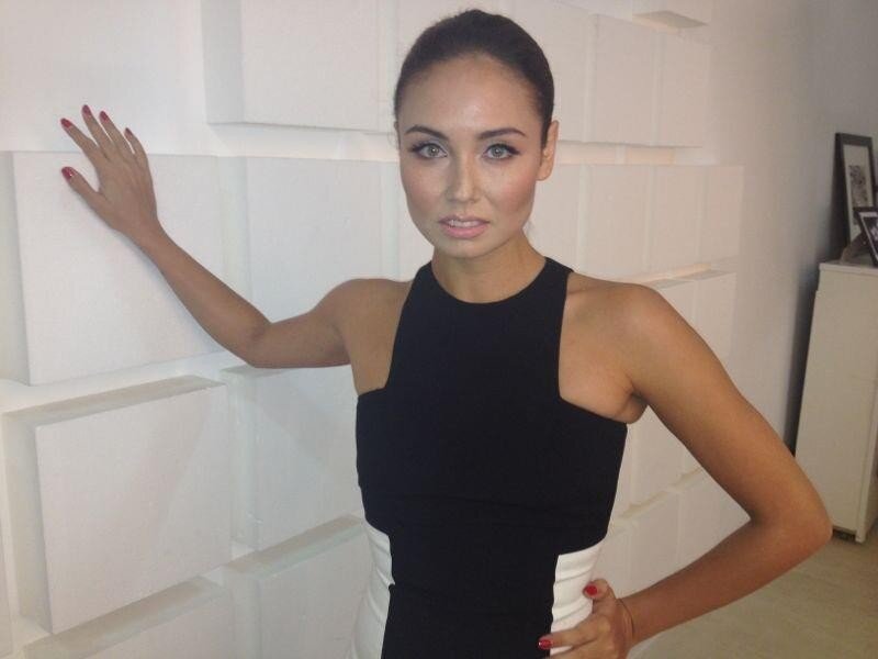 Woman in Black Dress — Neutral, Photograph, Wall, Nail Polish