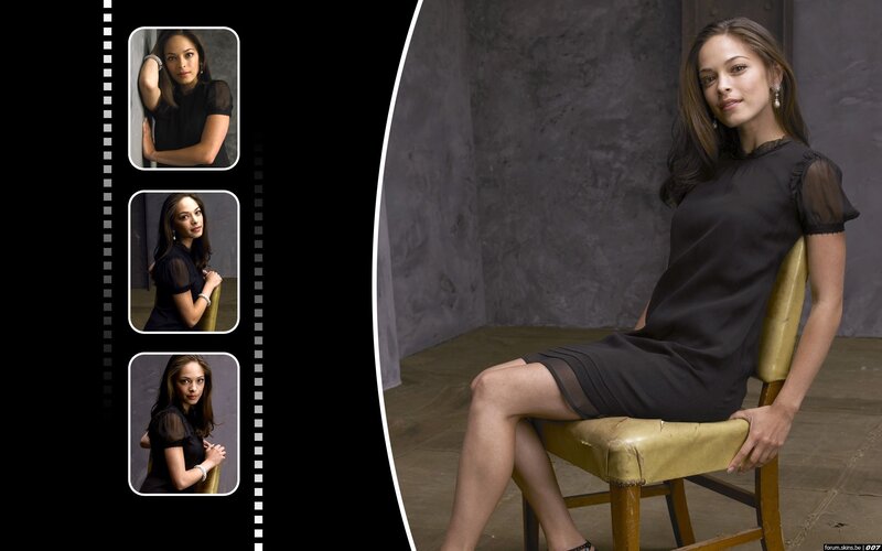woman in black dress on chair
