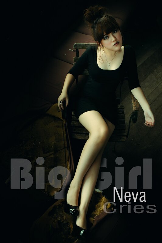 woman in black dress on chair