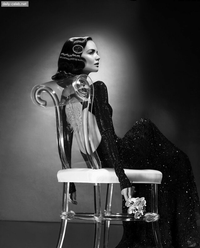 woman in black dress on chair