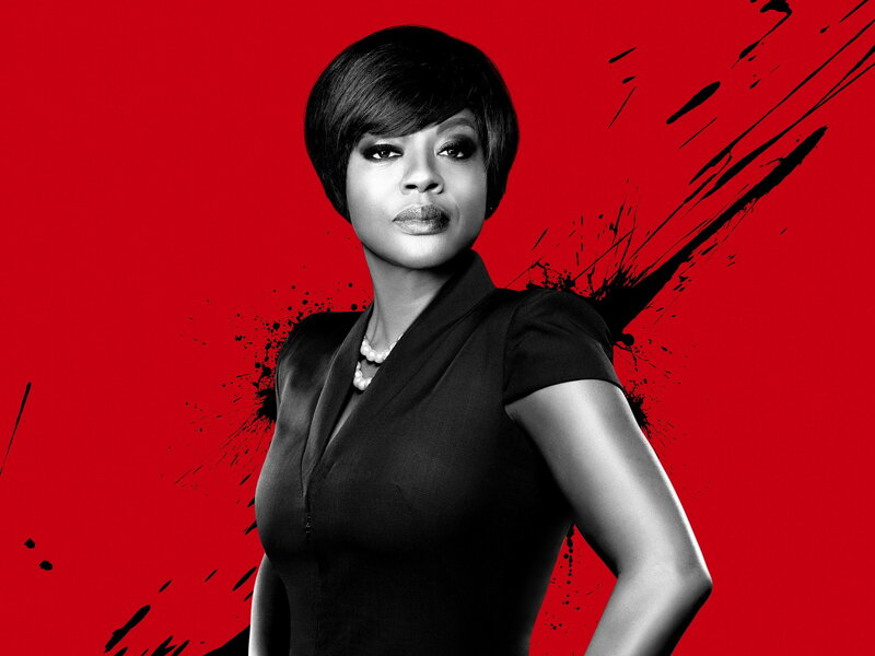 woman in black dress on red background