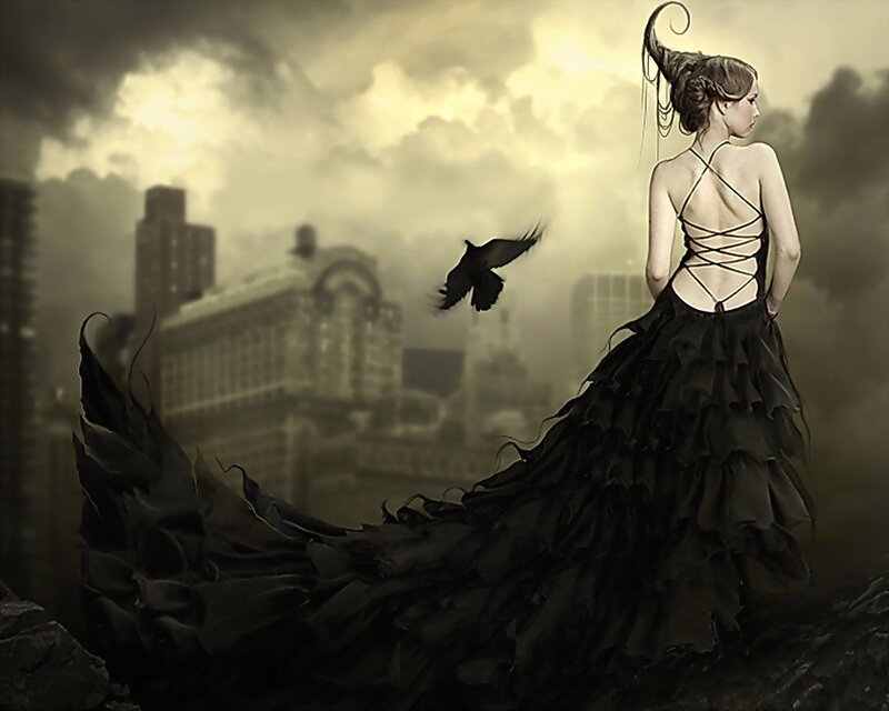 woman in black dress on rooftop