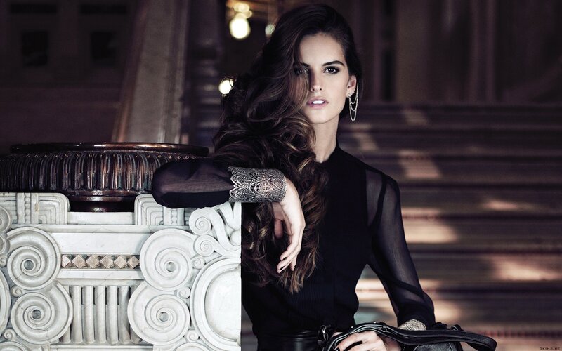 woman in black dress on stairs
