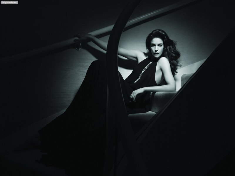 woman in black dress on stairs