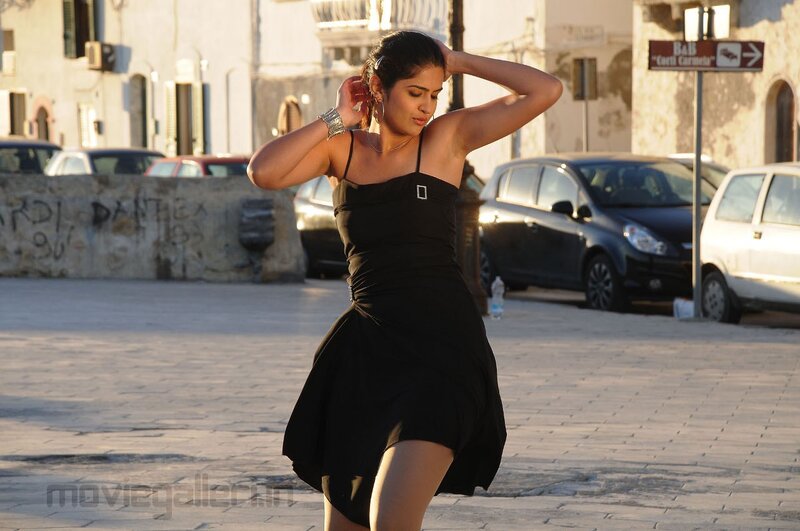 woman in black dress on street