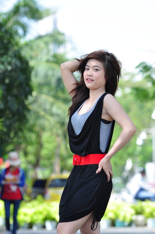 woman in black dress outdoors