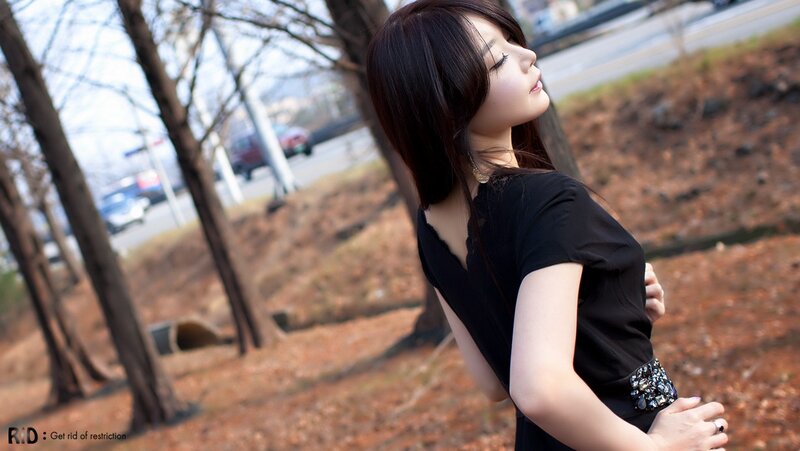 woman in black dress outdoors