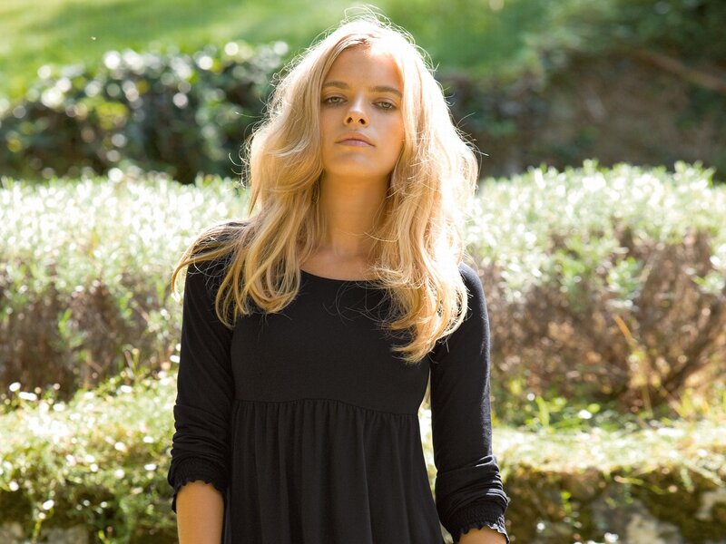 woman in black dress outdoors