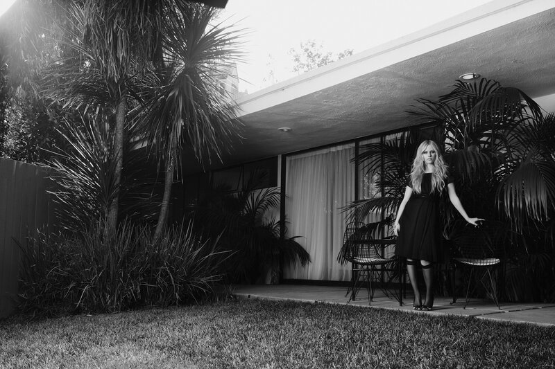 Woman in black dress outdoors