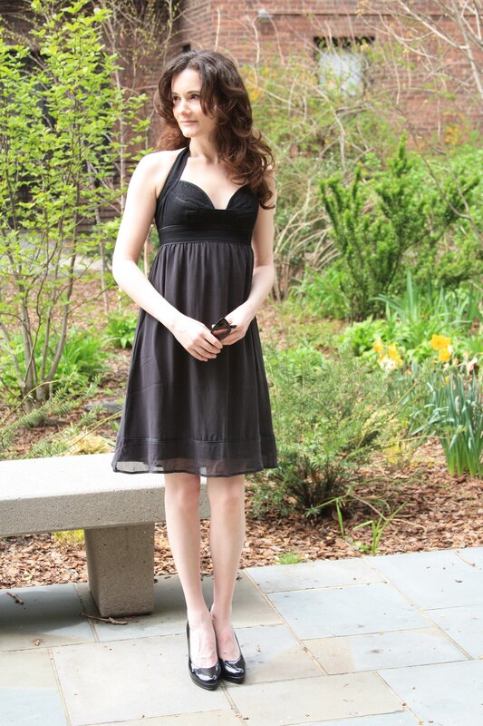 Woman in black dress outdoors