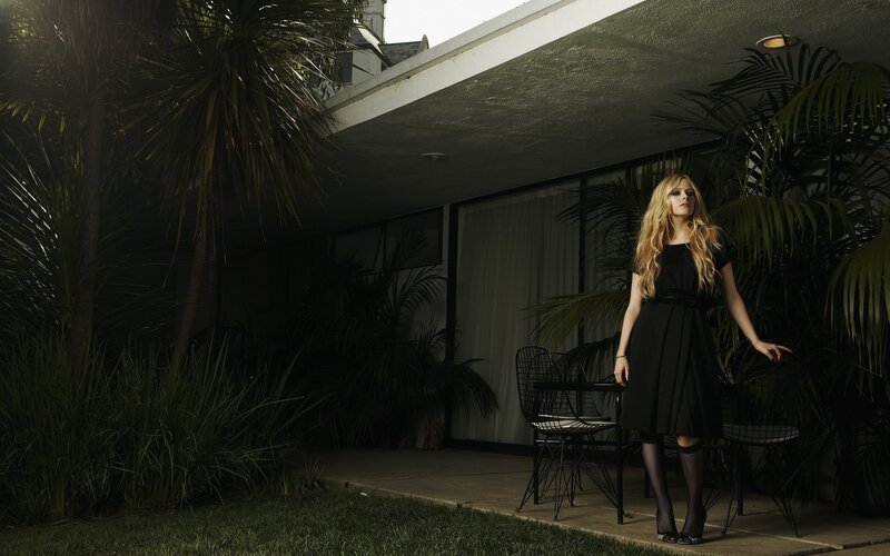 woman in black dress outdoors