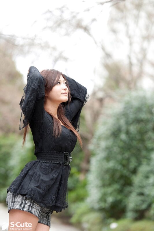Woman in black dress outdoors