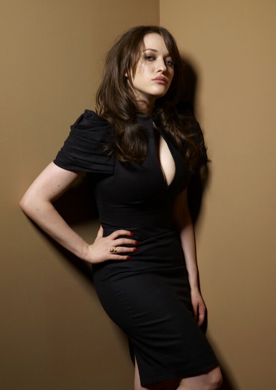 Woman in black dress posing