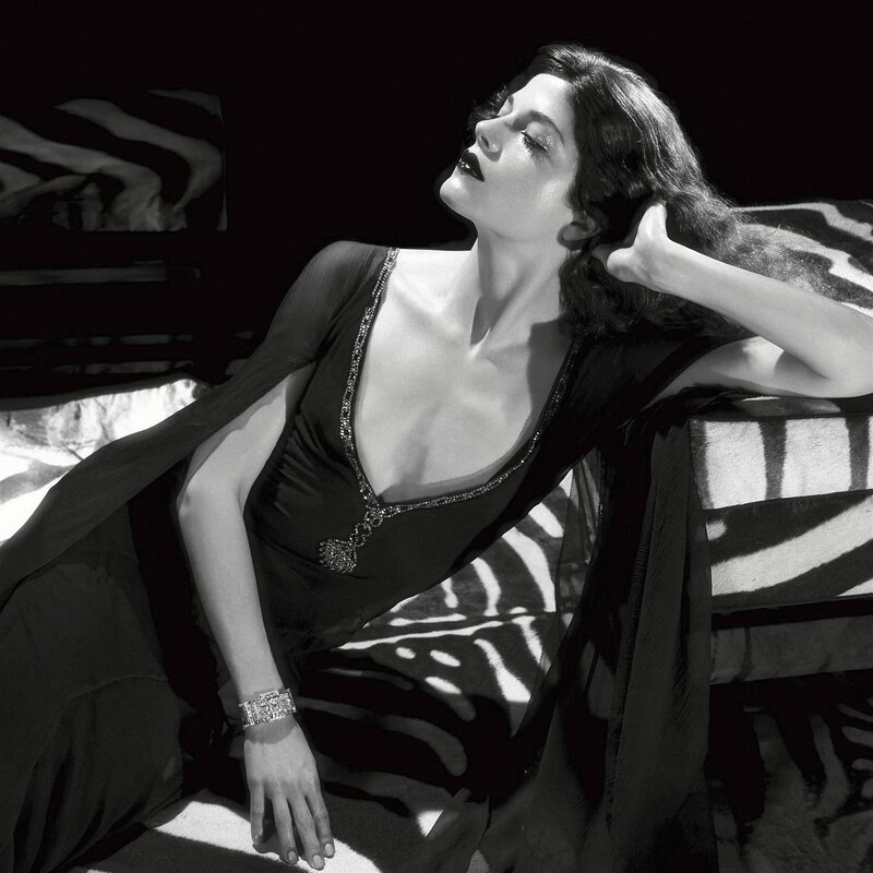 woman in black dress posing