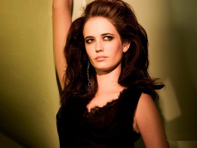 woman in black dress posing