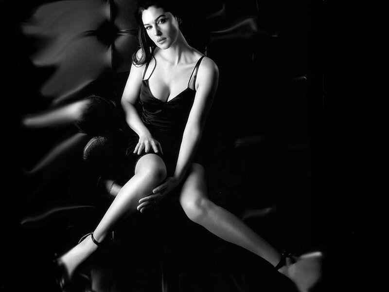 woman in black dress posing